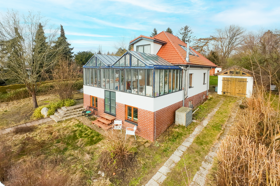 Einzigartiges Einfamilienhaus mit großem Potenzial und traumhaftem Weitblick ins Grüne!